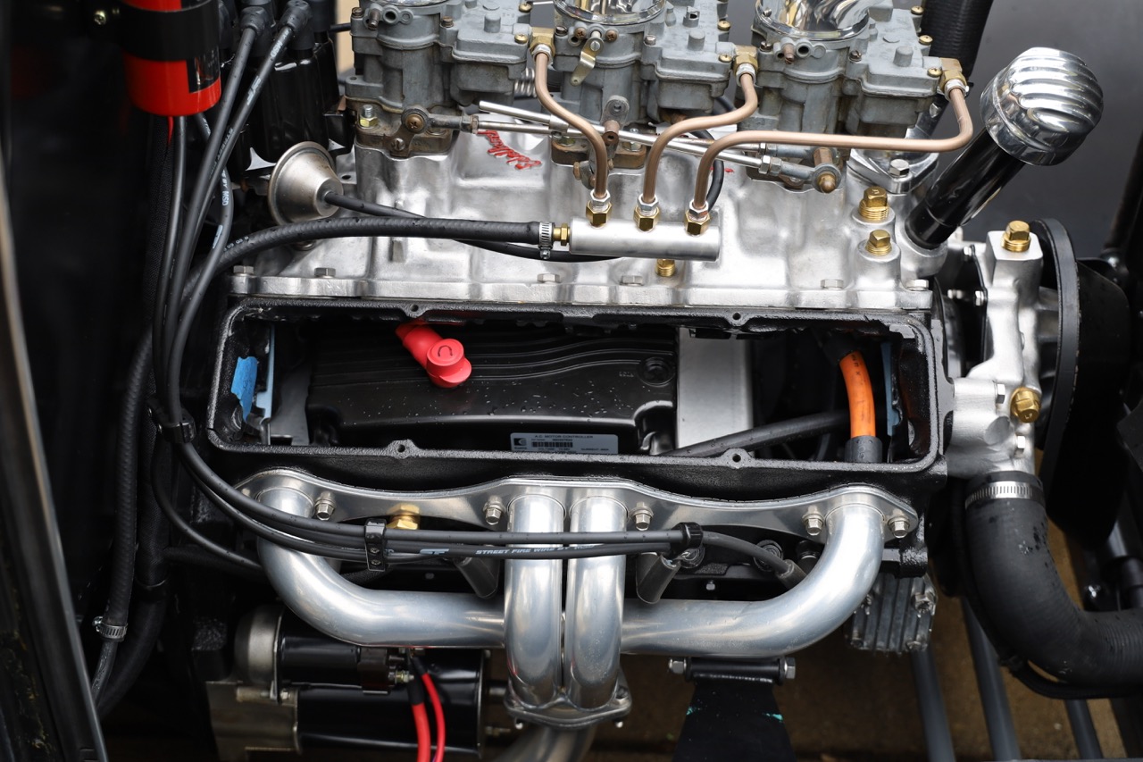 The same engine bay after the eV8 electric conversion — visually identical
